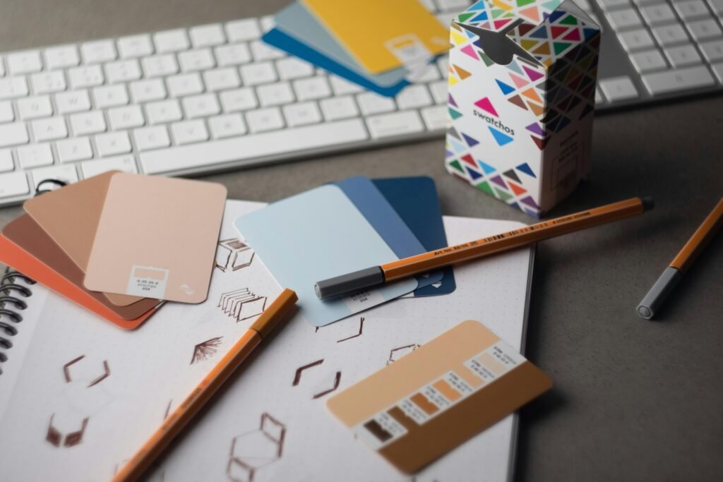 Brand identity colour samples on a desk