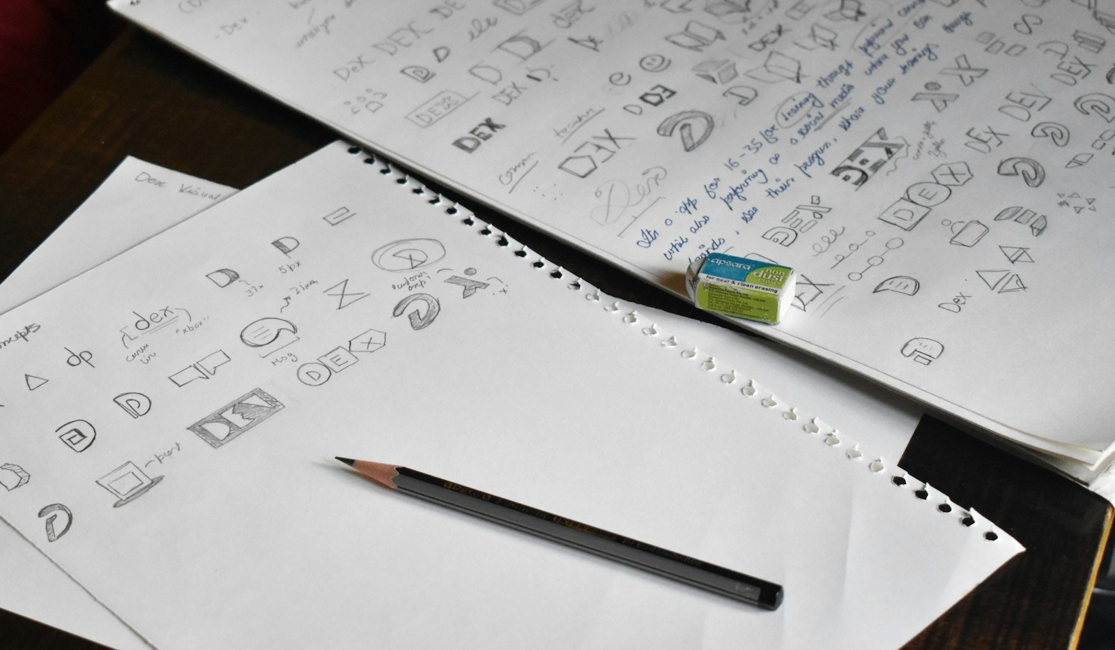 Brand refresh sketches on paper