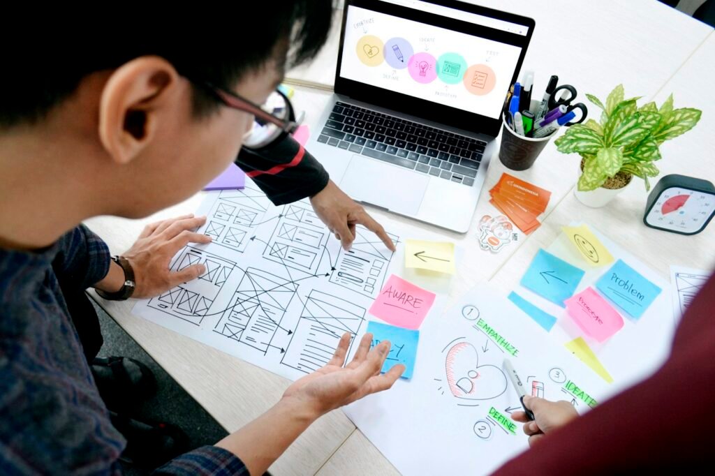 UI/UX designer working on website wireframes